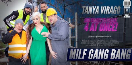 Hot big breasted Milf Tanya Virago is the center of a  good hard Gang Bang